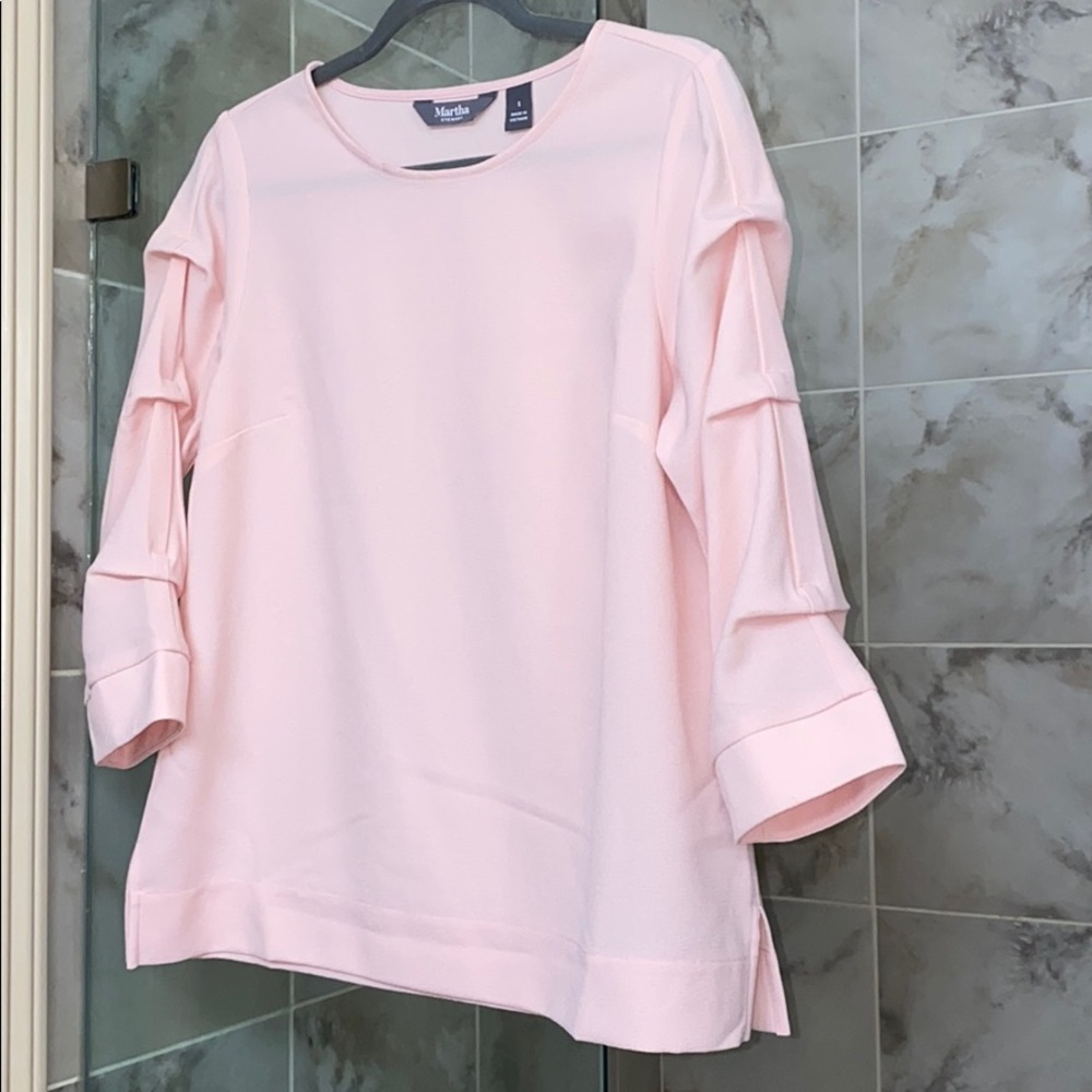 Beautiful light pink blouse with sleeve detail